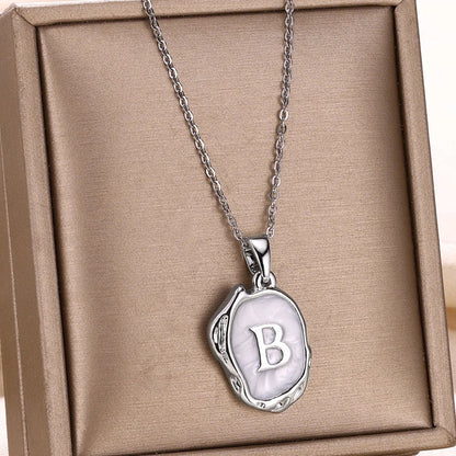 18-carat gold-plated ocean necklace with seabed initials