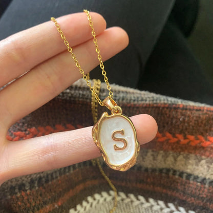 18-carat gold-plated ocean necklace with seabed initials