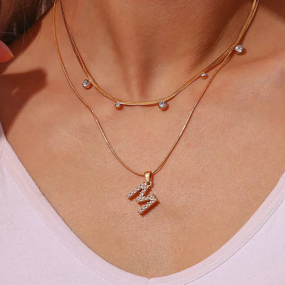 18-carat gold-plated initial necklace with precious pearls and small natural pearls