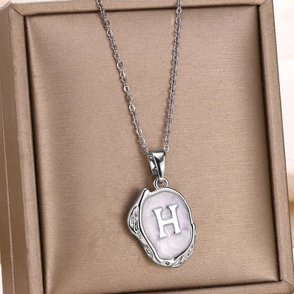 18-carat gold-plated ocean necklace with seabed initials