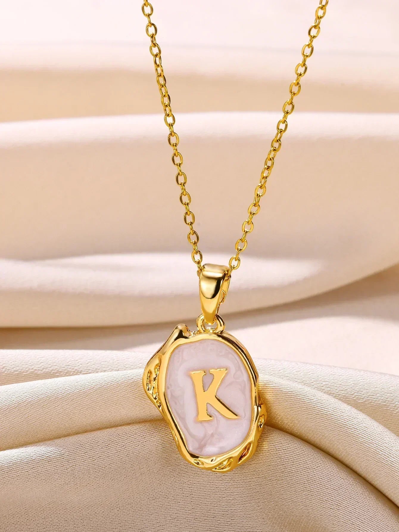 18-carat gold-plated ocean necklace with seabed initials