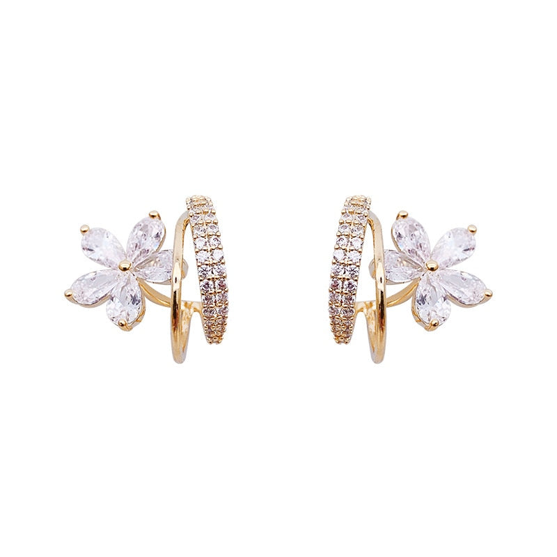 Gold floral earrings with zircon