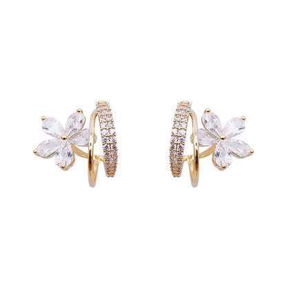 Gold floral earrings with zircon