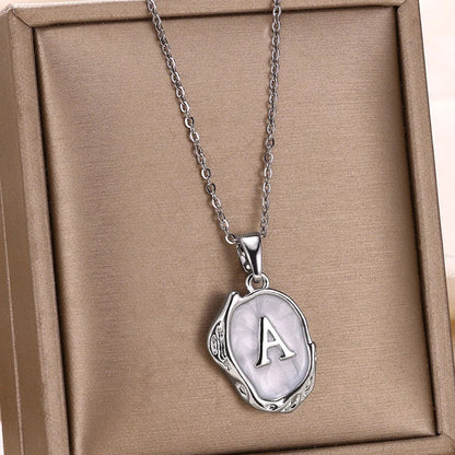 18-carat gold-plated ocean necklace with seabed initials