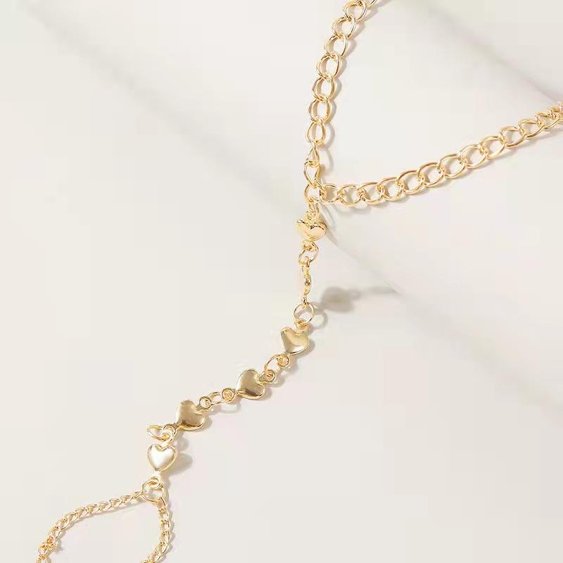 Living Hearts finger chain ring