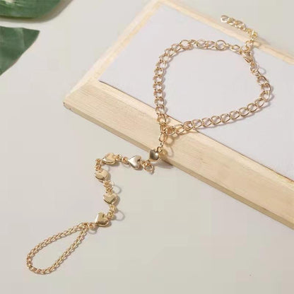 Living Hearts finger chain ring
