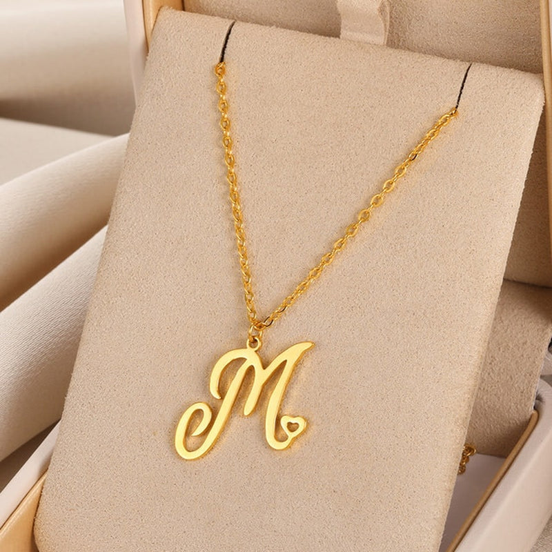 Initial pendant necklaces in cursive letter