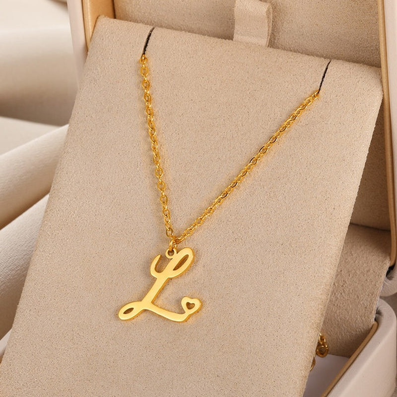 Initial pendant necklaces in cursive letter