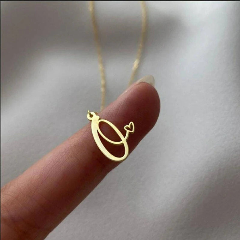 Initial pendant necklaces in cursive letter