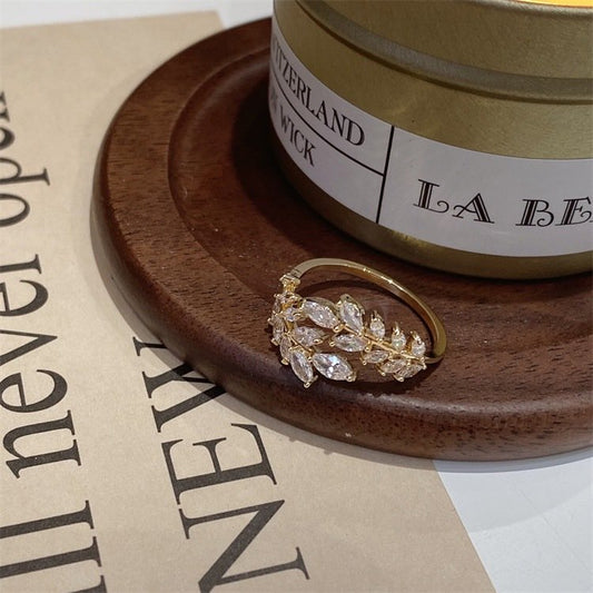 Gold-plated crown ring with zircons