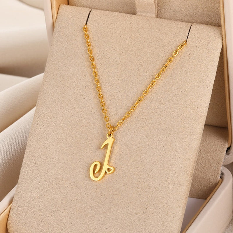 Initial pendant necklaces in cursive letter