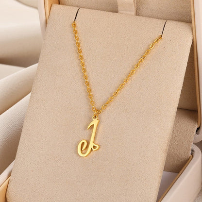 Initial pendant necklaces in cursive letter