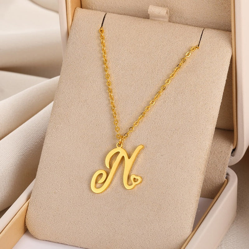 Initial pendant necklaces in cursive letter