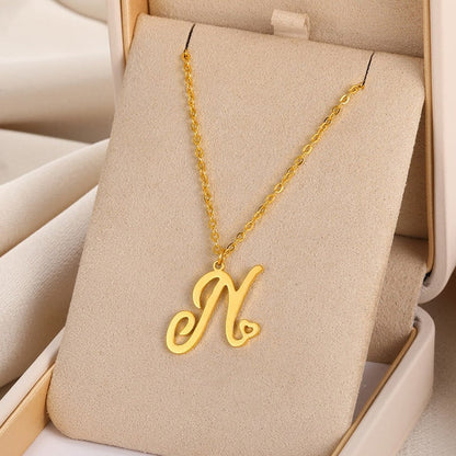 Initial pendant necklaces in cursive letter