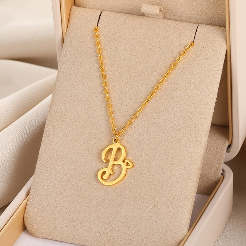 Initial pendant necklaces in cursive letter