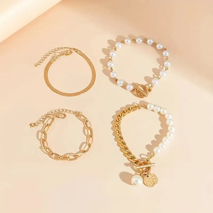 Chic Gold 4-piece Bracelet Set - Snake, Pearls and Links | Gold