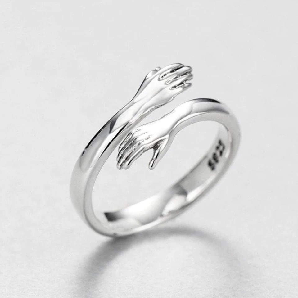 Adjustable silver hug ring