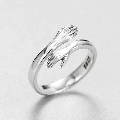 Adjustable silver hug ring