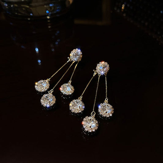 Zircon Triad gold-plated earrings