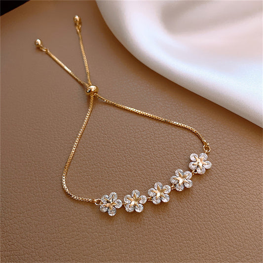 18-carat gold-plated adjustable floral bracelet