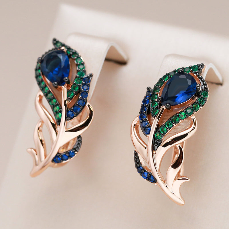 18-carat rose gold-plated peacock feather earrings with sapphires