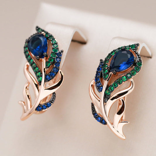 18-carat rose gold-plated peacock feather earrings with sapphires