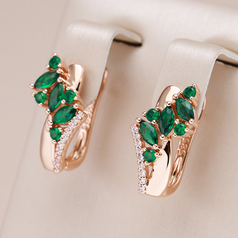 18-carat rose gold earrings with emeralds