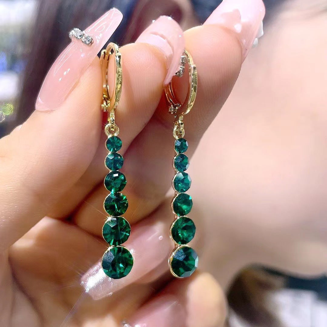 18-carat rose gold-plated long earrings with emeralds