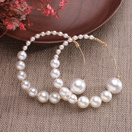 Handmade solid silver earrings with natural freshwater pearls