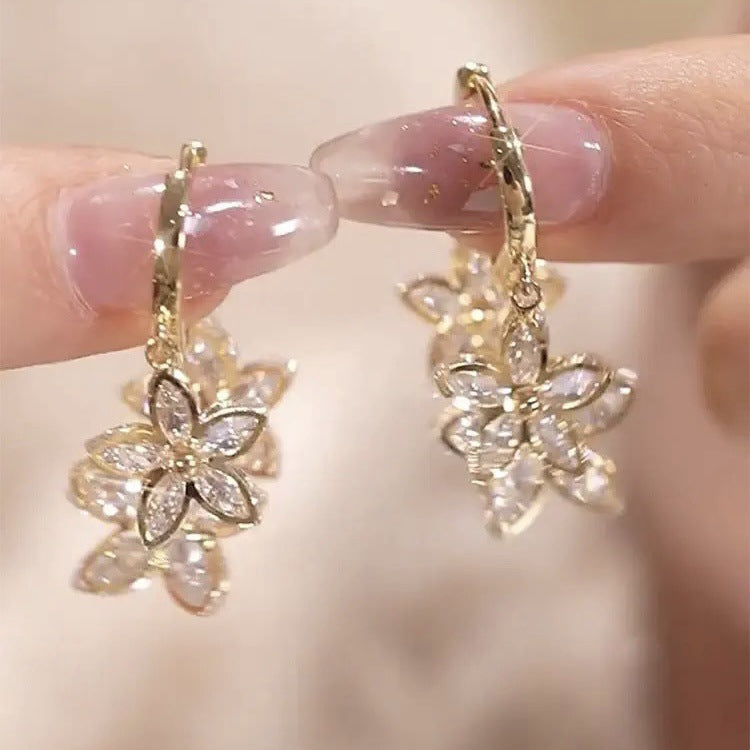 Creative Spring Star drop earrings